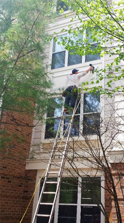 Multi-Family siding repairs in Reston, VA by Reston Painting & Contracting